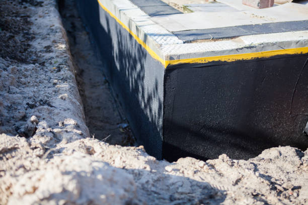 Professional Waterproofing technician working in Bainbridge, OH